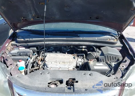 2010 Honda Odyssey Ex-L z USA, uszkodzony, nr VIN 5FNRL3H79AB033745